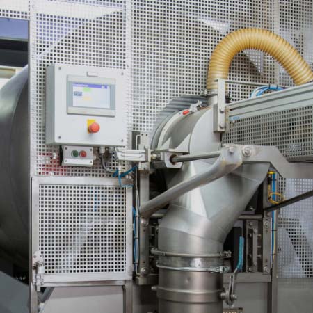 Hoses, controls, switches and display of a large machine for processing botanicals